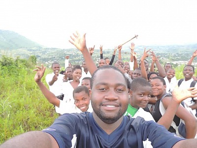 Our director with secondary students volunteers